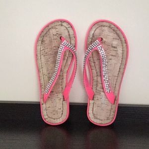 Pink rhinestone flip-flops